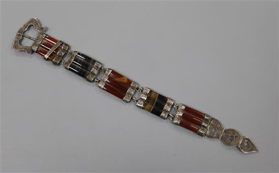 A late Victorian engraved white metal and banded agate link bracelet, overall 23cm.